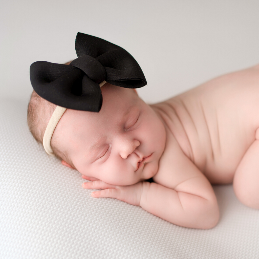 Keep your newborn baby safe. Hair Bows come OFF!