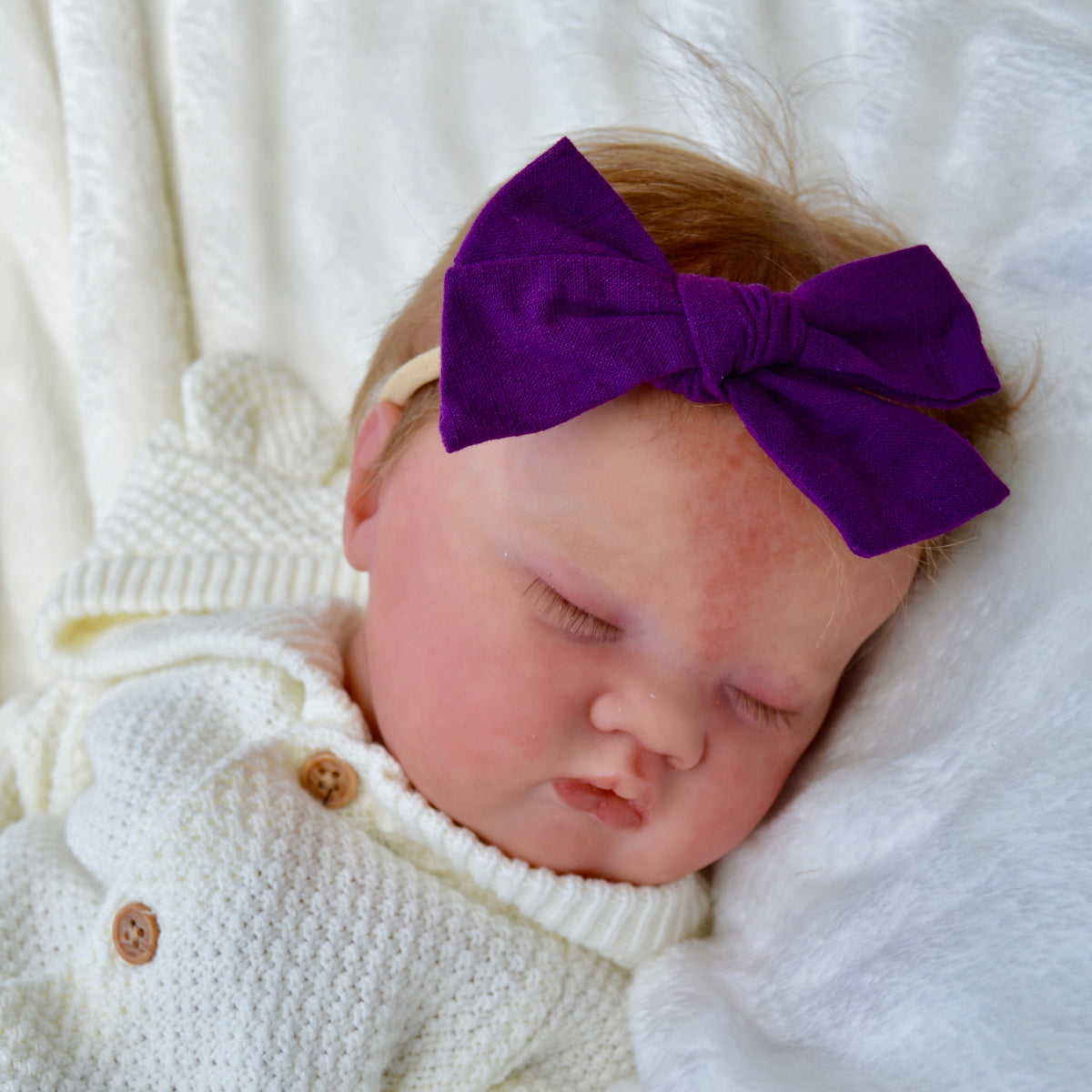 Purple store baby bow